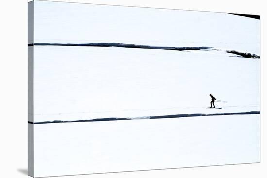 Skiers on the Sunwapta River in Jasper National Park, Alberta Canada-Richard Wright-Stretched Canvas