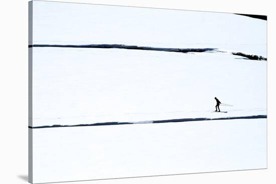 Skiers on the Sunwapta River in Jasper National Park, Alberta Canada-Richard Wright-Stretched Canvas