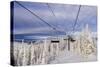 Skiers Ride Chairlift at Whitefish Mountain Resort, Montana, Usa-Chuck Haney-Stretched Canvas