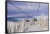 Skiers Ride Chairlift at Whitefish Mountain Resort, Montana, Usa-Chuck Haney-Framed Stretched Canvas