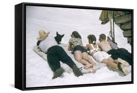 Skiers Sunbathing in Summer Fashions with Dog at Sun Valley Ski Resort, Idaho, April 22, 1947-George Silk-Framed Stretched Canvas