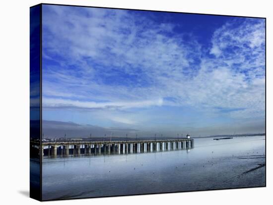 Skies over the Pier-Adrian Campfield-Stretched Canvas