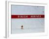 Skiier Arrives at the Finish Line-Paul Sutton-Framed Photographic Print