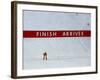 Skiier Arrives at the Finish Line-Paul Sutton-Framed Photographic Print