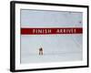 Skiier Arrives at the Finish Line-Paul Sutton-Framed Photographic Print