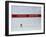 Skiier Arrives at the Finish Line-Paul Sutton-Framed Photographic Print