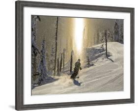 Skiing Through a Sundog on Corduroy Groomed Runs at Whitefish Mountain Resort, Montana, Usa-Chuck Haney-Framed Photographic Print