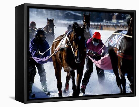 Skijouring, Skiing Behind a Race Horse at Full Gallop, on the Frozen Lake at St,Moritz, Switzerland-John Warburton-lee-Framed Stretched Canvas