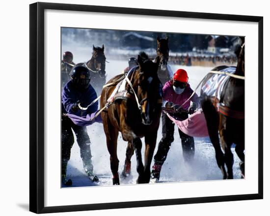 Skijouring, Skiing Behind a Race Horse at Full Gallop, on the Frozen Lake at St,Moritz, Switzerland-John Warburton-lee-Framed Photographic Print