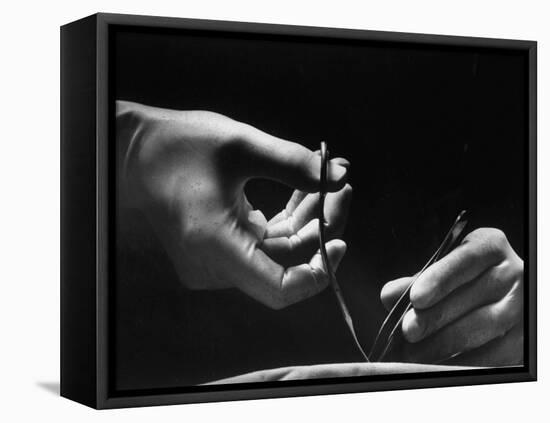 Skilled Hands of a Pediatric Surgeon at John Hopkins Hospital-null-Framed Stretched Canvas