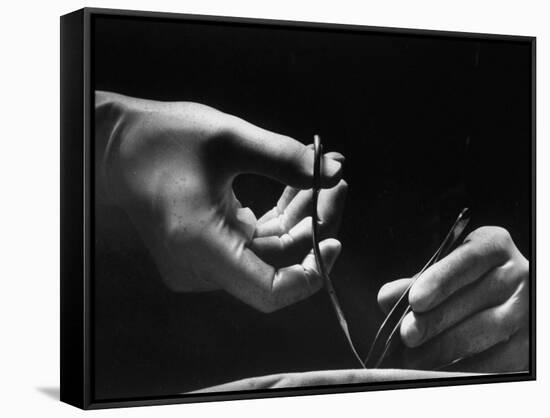 Skilled Hands of a Pediatric Surgeon at John Hopkins Hospital-null-Framed Stretched Canvas