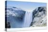 Skogafoss Waterfall in snow, Iceland, Polar Regions-Alex Robinson-Stretched Canvas