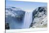 Skogafoss Waterfall in snow, Iceland, Polar Regions-Alex Robinson-Stretched Canvas