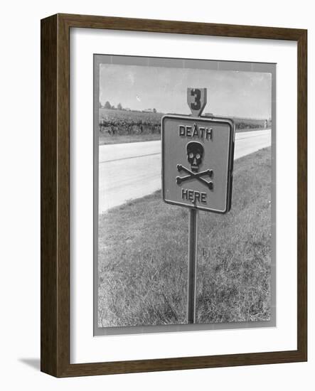 Skull and Crossbones Surrounded by the Words "Death Here" marking fatal car accident-Alfred Eisenstaedt-Framed Photographic Print