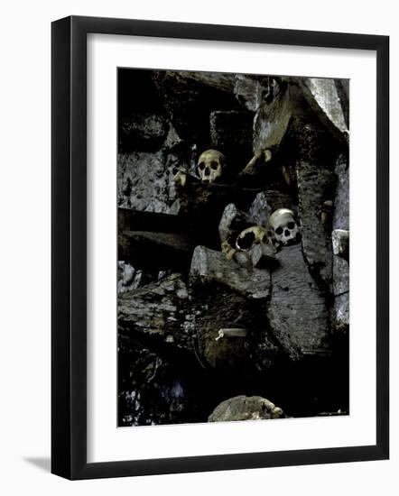 Skulls Amongst Rocks, Indonesia-Michael Brown-Framed Photographic Print