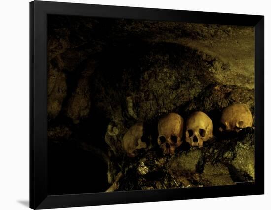 Skulls in Caves, Indonesia-Michael Brown-Framed Photographic Print