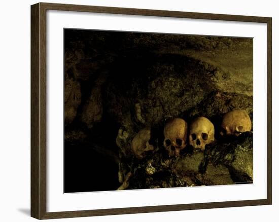 Skulls in Caves, Indonesia-Michael Brown-Framed Photographic Print