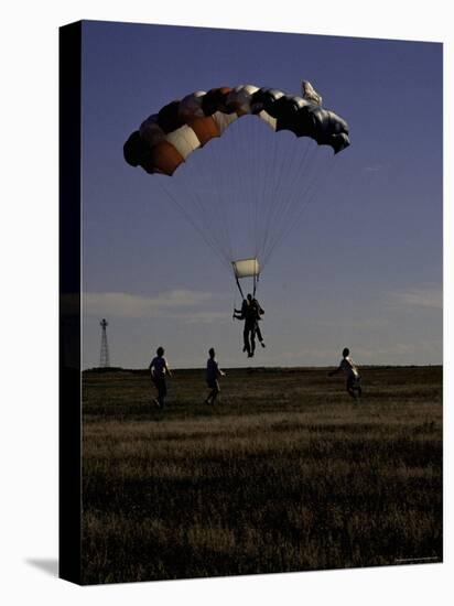 Skydiver Landing, USA-Michael Brown-Stretched Canvas