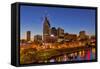 Skyline at Dusk over the Cumberland River in Nashville Tennessee-Chuck Haney-Framed Stretched Canvas