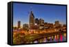 Skyline at Dusk over the Cumberland River in Nashville Tennessee-Chuck Haney-Framed Stretched Canvas