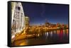 Skyline at Dusk over the Cumberland River in Nashville Tennessee-Chuck Haney-Framed Stretched Canvas