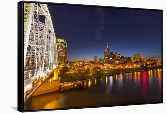 Skyline at Dusk over the Cumberland River in Nashville Tennessee-Chuck Haney-Framed Stretched Canvas