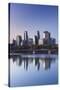 Skyline from the Mississippi River, Minneapolis, Minnesota, USA-Walter Bibikow-Stretched Canvas