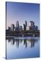 Skyline from the Mississippi River, Minneapolis, Minnesota, USA-Walter Bibikow-Stretched Canvas