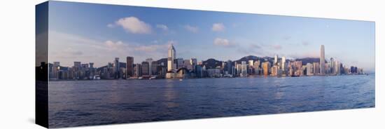 Skyline of Central, Hong Kong Island, from Victoria Harbour, Hong Kong, China, Asia-Gavin Hellier-Stretched Canvas