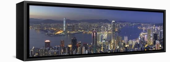 Skyline of Hong Kong Island and Kowloon from Victoria Peak at dusk, Hong Kong Island-Ian Trower-Framed Stretched Canvas