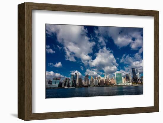 Skyline of Midtown Manhattan seen from the East River showing the Chrysler Building and the Unit...-null-Framed Photographic Print