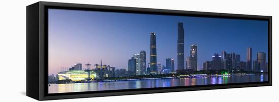 Skyline of Tianhe at dusk, Guangzhou, Guangdong, China-Ian Trower-Framed Stretched Canvas