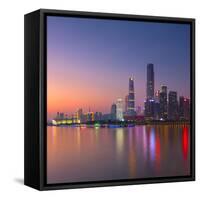 Skyline of Tianhe at sunset, Guangzhou, Guangdong, China-Ian Trower-Framed Stretched Canvas