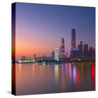 Skyline of Tianhe at sunset, Guangzhou, Guangdong, China-Ian Trower-Stretched Canvas