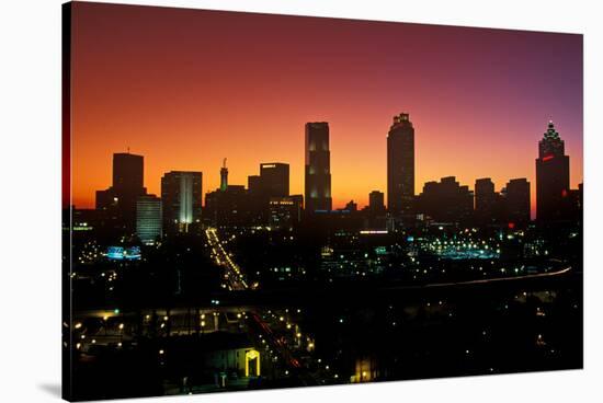 Skyline view at sunset of the state capital of Atlanta, Georgia-null-Stretched Canvas