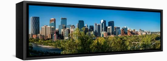 Skylines in a city, Bow River, Calgary, Alberta, Canada-null-Framed Stretched Canvas