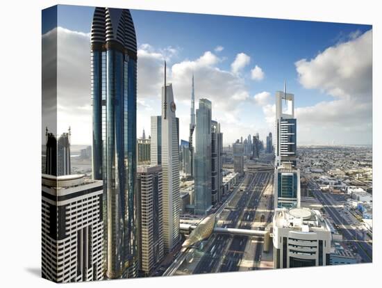 Skyscrapers Along Sheikh Zayed Road Looking Towards the Burj Kalifa, Dubai, United Arab Emirates-Gavin Hellier-Stretched Canvas