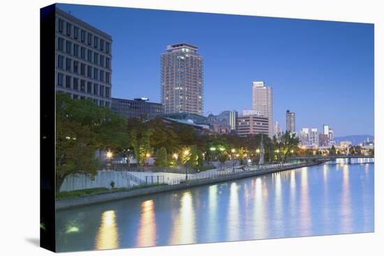 Skyscrapers and Park on Nakanoshima Island at Dusk, Kita, Osaka, Kansai, Japan-Ian Trower-Stretched Canvas