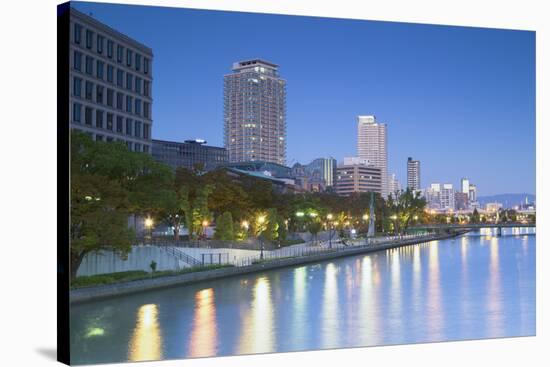 Skyscrapers and Park on Nakanoshima Island at Dusk, Kita, Osaka, Kansai, Japan-Ian Trower-Stretched Canvas