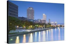 Skyscrapers and Park on Nakanoshima Island at Dusk, Kita, Osaka, Kansai, Japan-Ian Trower-Stretched Canvas