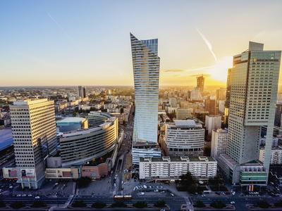 https://imgc.allpostersimages.com/img/posters/skyscrapers-at-sunset-city-centre-warsaw-masovian-voivodeship-poland-europe_u-L-Q1BT1DC0.jpg?artPerspective=n
