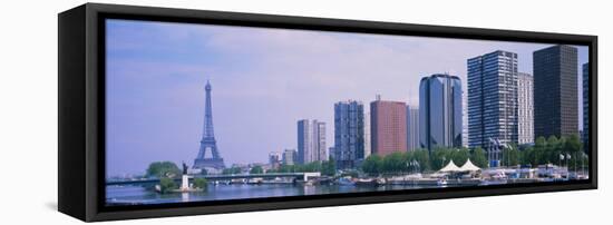 Skyscrapers at Waterfront with Tower in Background, Seine River, Eiffel Tower, Paris, France-null-Framed Stretched Canvas