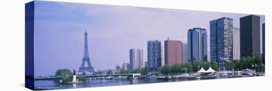 Skyscrapers at Waterfront with Tower in Background, Seine River, Eiffel Tower, Paris, France-null-Stretched Canvas