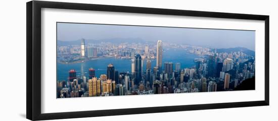 Skyscrapers in a City, Victoria Harbour, Hong Kong, China-null-Framed Photographic Print