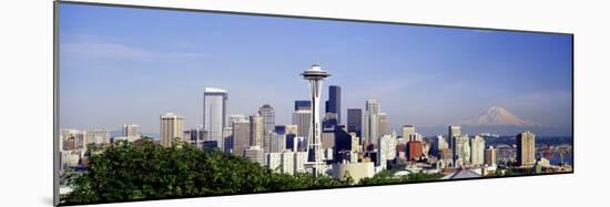 Skyscrapers in a City with a Mountain in the Background, Mt Rainier, Mt Rainier National Park-null-Mounted Photographic Print