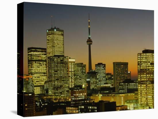 Skyscrapers Lit Up at Dusk, Toronto Eaton Centre, Toronto, Ontario, Canada-null-Stretched Canvas