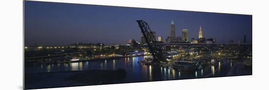 Skyscrapers Lit Up at Night in a City, Cleveland, Ohio, USA-null-Mounted Photographic Print