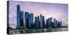 Skyscrapes line Marina Bay at dusk, Singapore, Southeast Asia, Asia-Logan Brown-Stretched Canvas