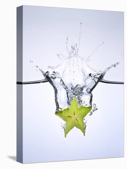 Slice of Carambola Falling into Water-Kröger & Gross-Stretched Canvas