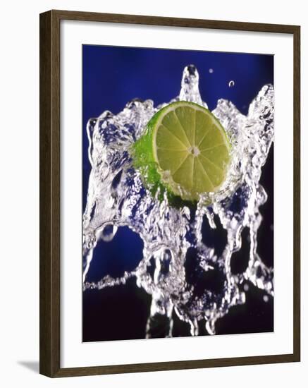 Slice of Lime on Splashing Water-Dirk Olaf Wexel-Framed Photographic Print